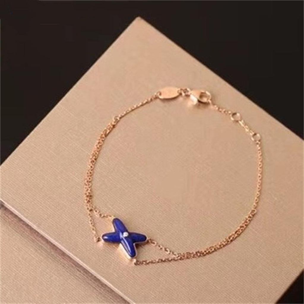 ¡®Loco¡¯Hollow Design Four-Leaf Clover Flower Shape Ring